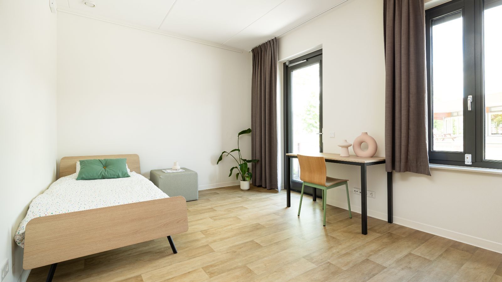 Een slaapkamer in het logeerhuis Twister